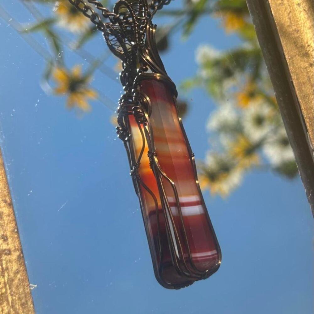 Hand wrapped carnelian agate pendant